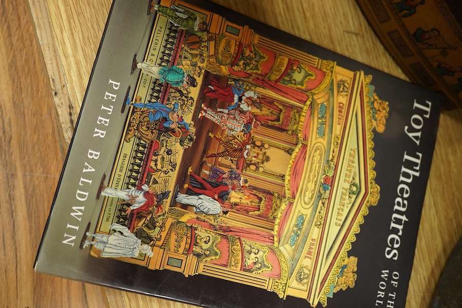 Five card toy theatres and a book The World of Toy Theatres, by Peter Baldwin. Largest front panel 36.5cm high